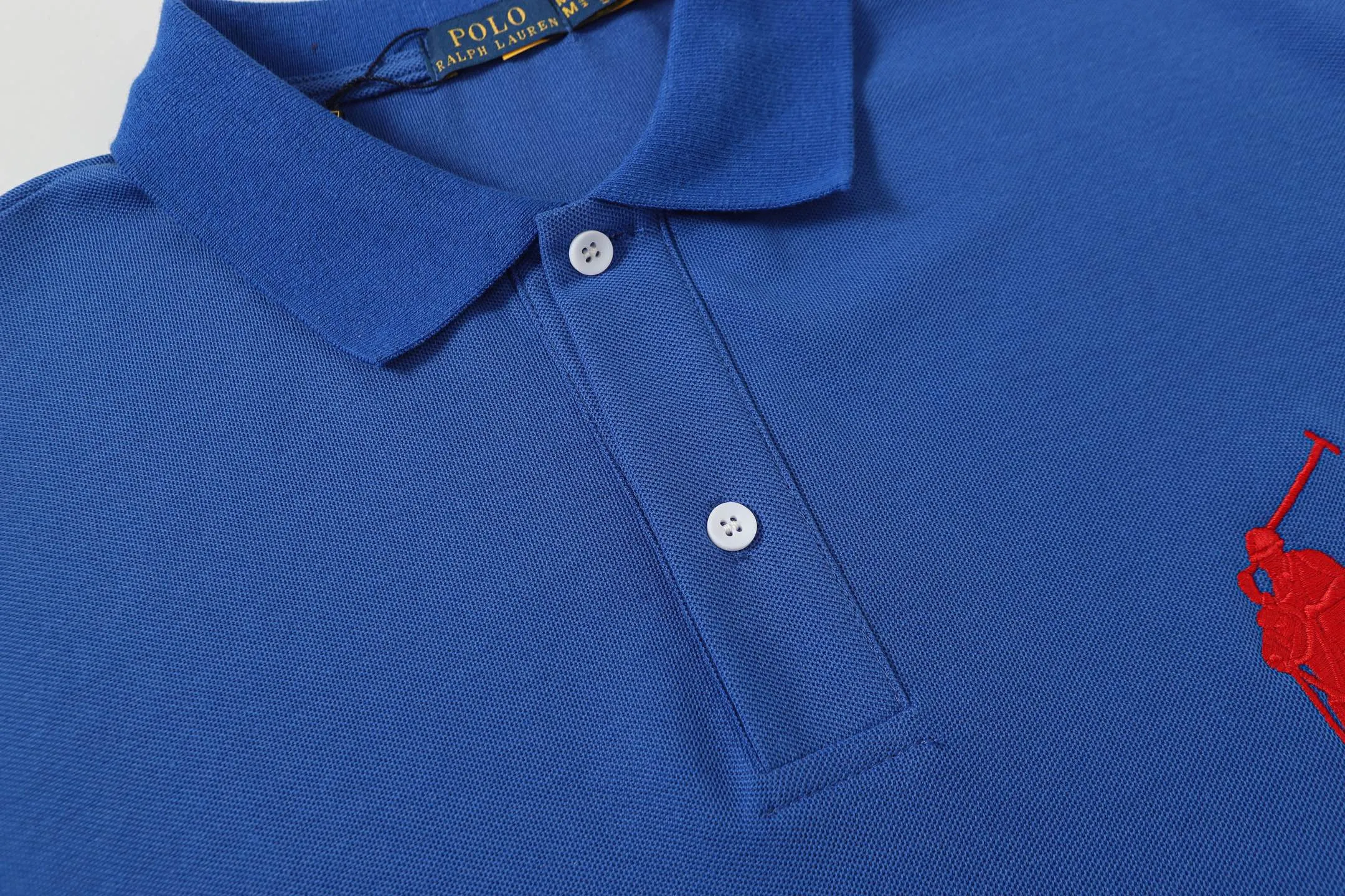 P150 Style No.: A012 [Ralph Lauren Classic Logo Embroidered Polo Shirt] ✅250g fine cotton pique fabric, custom-woven and dyed threads ✅Original stickers Scan the QR code to enter the official website ✅Large version, loose and stylish, can wear up to 210 pounds Color: Black White Navy Blue Sky Blue Dark Gray Floral Gray Size: S-XL